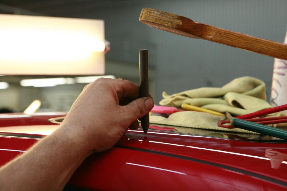 Detail work on a vehicle